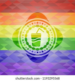 soda icon inside emblem on mosaic background with the colors of the LGBT flag