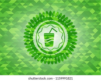 soda icon inside green emblem with mosaic background