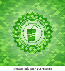 soda icon inside green emblem with triangle mosaic background