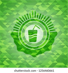 soda icon inside green emblem with mosaic background