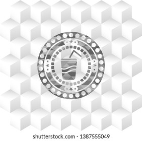 soda icon inside grey icon or emblem with geometric cube white background