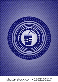 soda icon inside jean or denim emblem or badge background