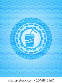 soda icon inside light blue water wave emblem background.