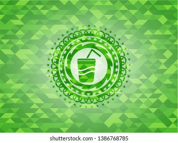 soda icon inside realistic green mosaic emblem