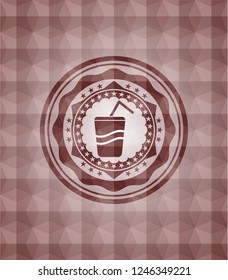 soda icon inside red seamless badge with geometric pattern.