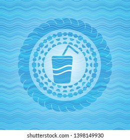 soda icon inside water concept emblem background.