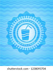 soda icon inside water representation emblem.