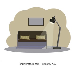 A sofa with olive green colored pillows with white polka dots. Floor lamp with a light on and a painting on the wall.