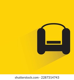sofa with shadow on yellow background