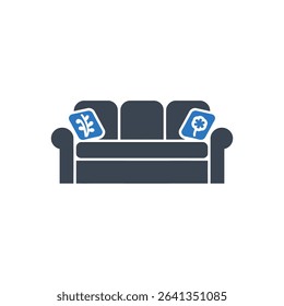 Sofa with two decorative pillows icon