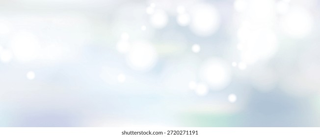 Fondo abstracto suave con brillantes luces bokeh en suaves tonos azules y blancos, creando una textura de ensueño y etérea para diversas aplicaciones de diseño