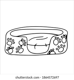 Soft bed for a dog or cat. Accessories for pets drawn by lines. An element from a set of doodles drawn by hand. Isolated illustration on a white background.