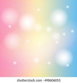 Soft color glitter sparkles defocused rays lights bokeh abstract christmas background.