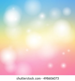 Soft color glitter sparkles defocused rays lights bokeh abstract christmas background.