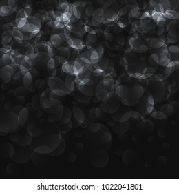 Soft colorful bokeh background. Luminous garlands of electric lights. Copy space to add text. Saturated colors. Blurry abstraction. Gentle tone. Dark night. Festive party in city. Defocus effect.