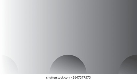 Soft gray spheres partially visible at the bottom, with a smooth gradient background transitioning from light to dark gray.