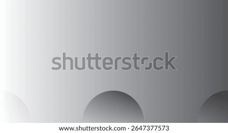 Soft gray spheres partially visible at the bottom, with a smooth gradient background transitioning from light to dark gray.