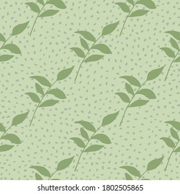 Soft green foliage ornament seamless botanic pattern. Light pastel background with dots. Floral stylized print. Creative backdrop for wallpaper, textile, wrapping paper, fabric. Vector illustration