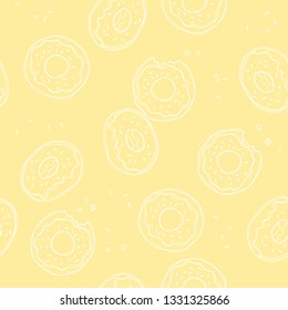 Soft, pastel yellow background with donuts. Vector seamless pattern with donuts. Cute sweet food baby background. Colorful design for textile, wallpaper, fabric, decor.