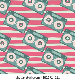 Soft tones cassette seamless pattern. Hand drawn music elements in pastel palette on pink stripped background. Great for wallpaper, textile, wrapping paper, fabric print. Vector illustration.