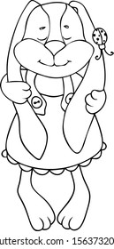 Soft toy cute rabbit in a dress with a bug on the ear