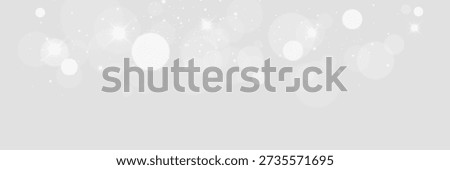 Soft white bokeh lights with sparkling particles on a light background, creating a clean airy glow effect suitable for elegant designs, overlays, celebrations, and minimal visual compositions.