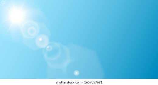 Soft white sun on blue background with many realistic flares