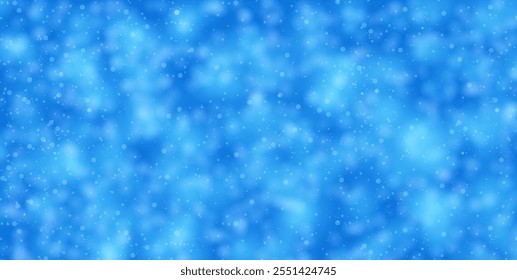 A softly blurred blue background with delicate snowfall dots, evoking a serene and frosty winter ambiance. Ideal for seasonal or festive design projects.