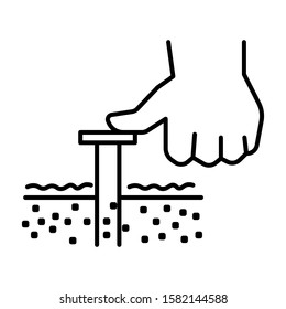 Soil sampler testing tool and hand linear icon