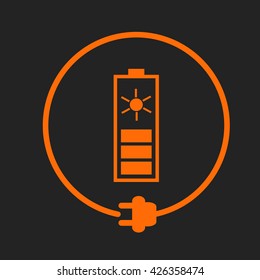 Solar battery in a circle with plug as symbol of eco-friendly energy source. Orange sign on black background