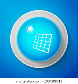 Solar energy panel icon isolated on blue background. Circle blue button. Vector illustration