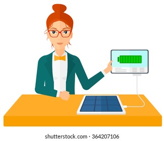 Solar panel charging tablet computer.