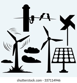 Solar panel and windmill, wires on a pole. Isolated on blue background. Vector silhouettes