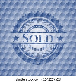 Sold blue badge with geometric pattern.