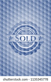 Sold blue emblem with geometric pattern.