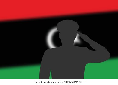 Solder silhouette on blur background with Libya flag. Template for memorial day