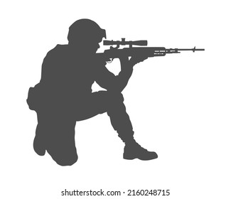 Soldier. Armed forces. Silhouette of a soldier. A soldier aims through the optical sight of a rifle