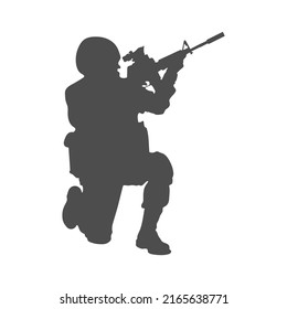 Soldado. Fuerzas armadas. Silhouette de un soldado. Un soldado apunta a través de la visión óptica de un rifle