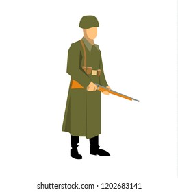 a soldier during the second world war, standing with a carbine in his hands. Dressed in a green overcoat
