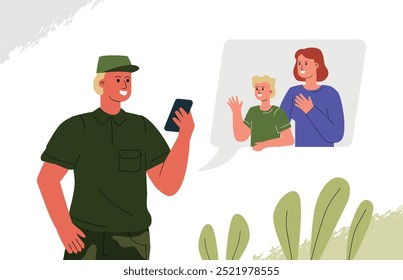 A soldier talks to his wife and child through a video call. Online communication with family while serving in the army.