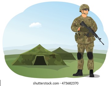 Soldier In Uniform, Ready To Fight. Army Camp. Military Tents On The Background.