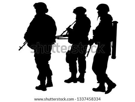 Soldier in uniform with weapon on white background