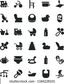 solid black flat icon set toys over the cradle vector, dummy, mug for feeding, bottle, measuring, diaper, bib, baby, beanbag, rattle, chair, car child seat, stroller, carriage, summer, rubber duck