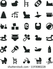 solid black flat icon set toys over the cradle vector, dummy, feeding bottle, diaper, bib, baby, beanbag, rattle, chair, car child seat, stroller, carriage, rubber duck, duckling, bath ball, tumbler