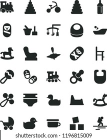 solid black flat icon set toys over the cradle vector, dummy, measuring bottle for feeding, diaper, bib, baby, beanbag, rattle, chair, stroller, rubber duck, duckling, children's bathroom, toy, a