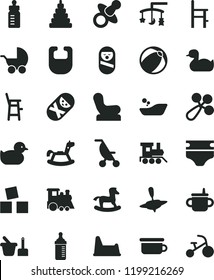 solid black flat icon set toys over the cradle vector, dummy, mug for feeding, bottle, measuring, diaper, bib, baby rattle, chair, stroller, summer, rubber duck, duckling, bath ball, stacking toy, a