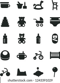 Solid Black Vector Icon Set - baby cot vector, mug for feeding, bottle, measuring, diaper, bib, carriage, stacking rings, roly poly doll, toy sand set, children's potty, chair, a child, teddy bear