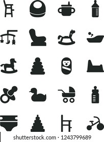 Solid Black Vector Icon Set - toys over the cradle vector, dummy, mug for feeding, bottle, measuring, diaper, baby bib, chair, carriage, rubber duck, children's bathroom, stacking rings, toy, potty