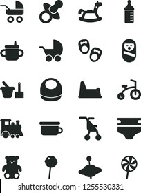 Solid Black Vector Icon Set - dummy vector, mug for feeding, measuring bottle, diaper, baby bib, stroller, carriage, sitting, roly poly doll, toy sand set, children's potty, chair, small teddy bear