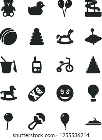 Solid Black Vector Icon Set - beanbag vector, baby duckling, bath ball, stacking rings, toy, tumbler, mobile phone, children's sand set, small teddy bear, yule, rocking horse, colored air balloons